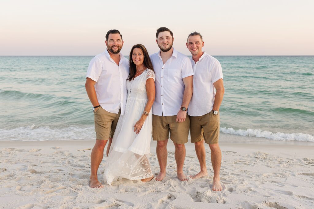 Mother and sons posing during photography session at Navarre Beach