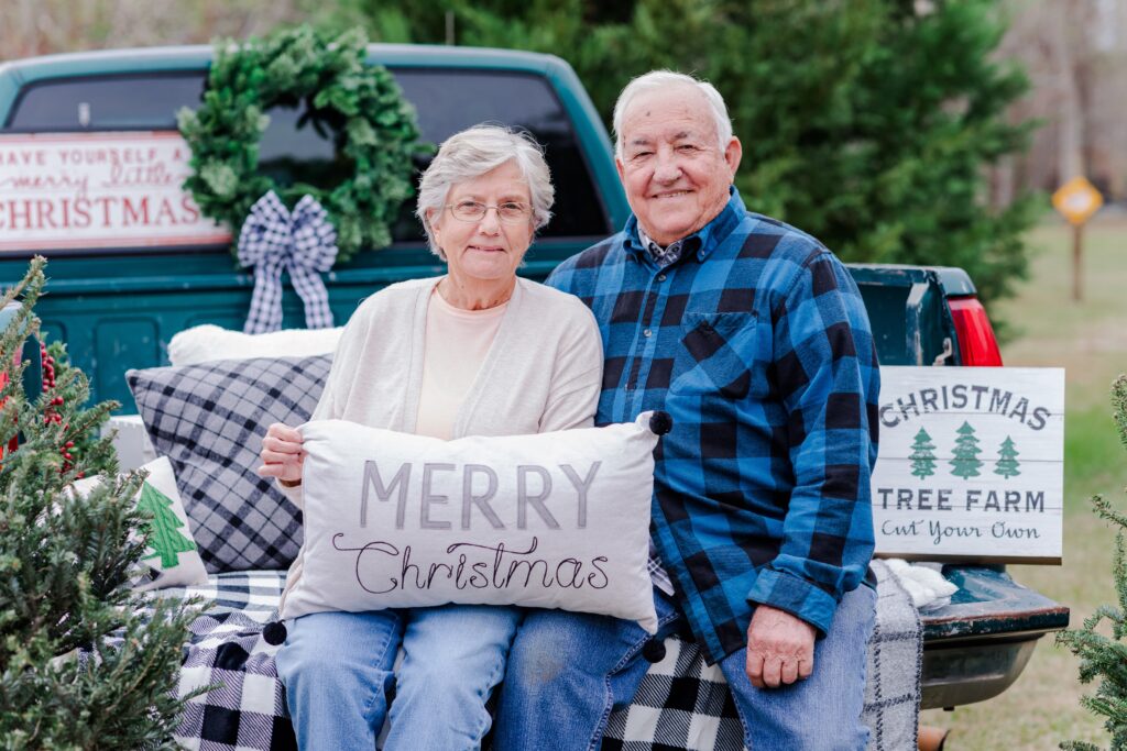 Grandma and Grandpa updating Christmas family pictures during mini-session