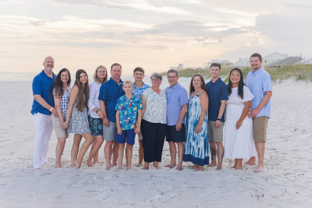 Grandparents with children and grandchildren on the beach during family photos with Jennifer Beal Photography.