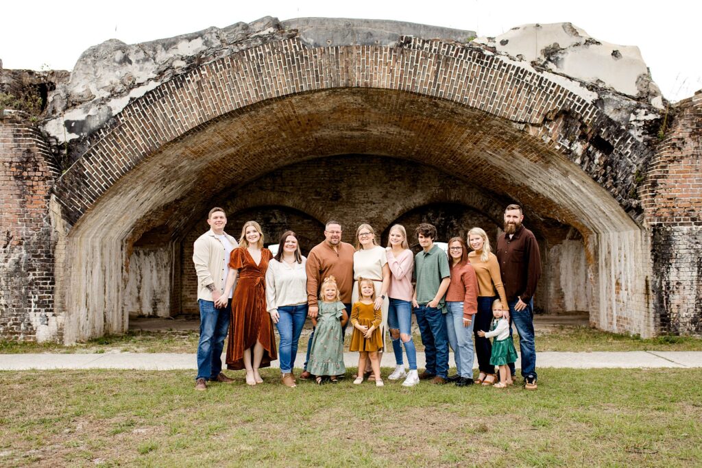 Extended family photo session in front of the fort at Fort Pickens.