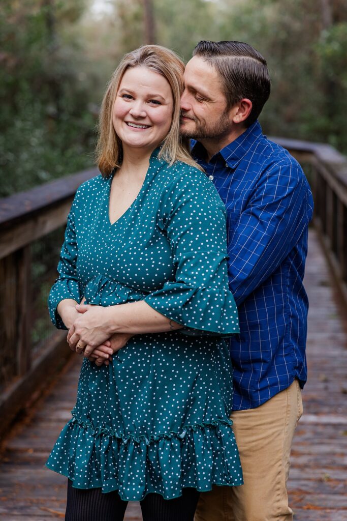 Parents pose during annual family photos by Pensacola Photographer, Jennifer Beal