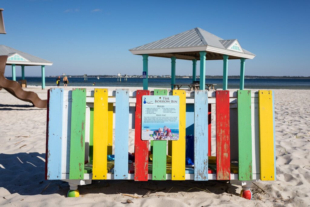 Borrow bin for shared beach toys at Park West