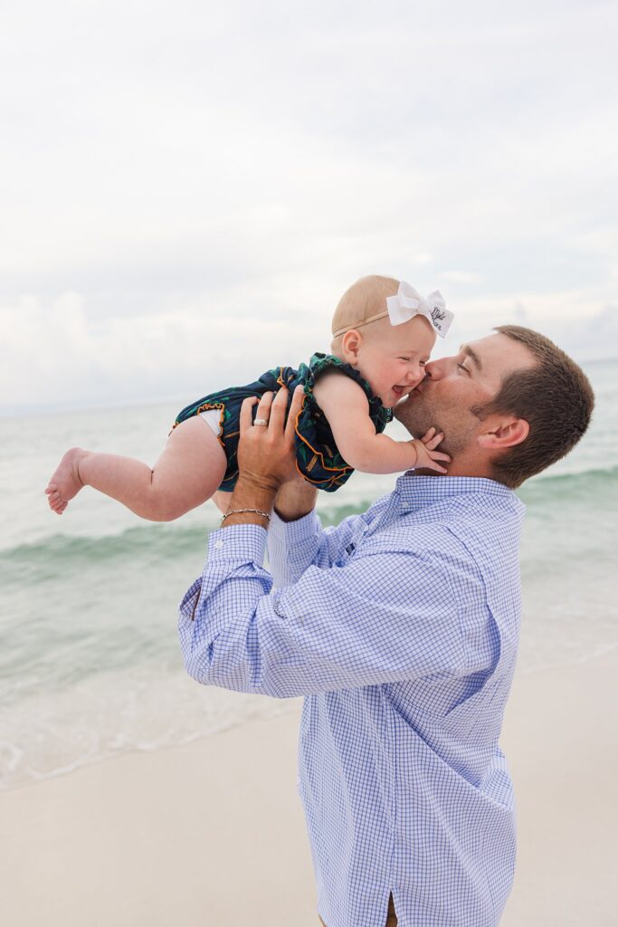 Family photo tips: Dad with baby during beach photo session